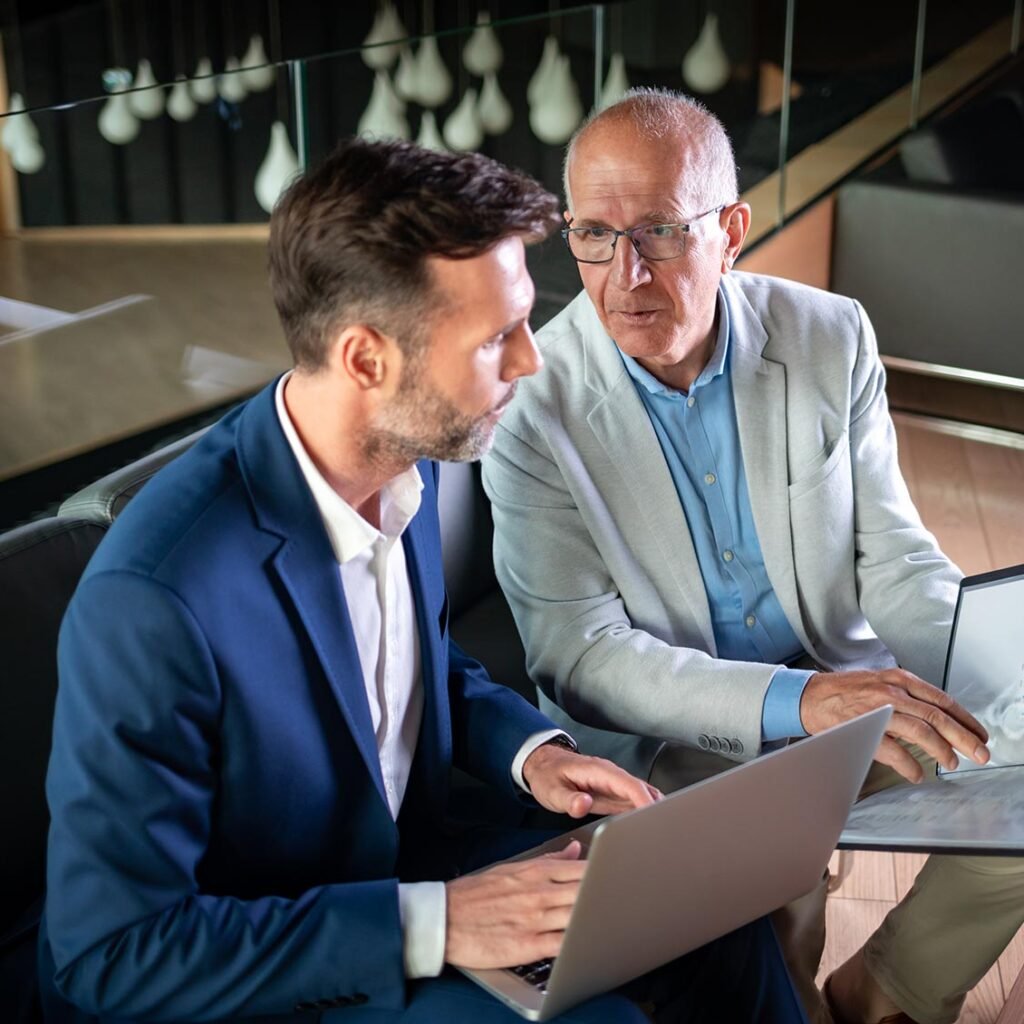 business people having meeting in modern office in JHHWL8D